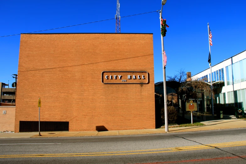 an image of a brick store front on a street