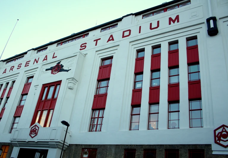 the building has red and white windows on it