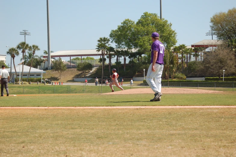 two men playing a game of baseball on a field