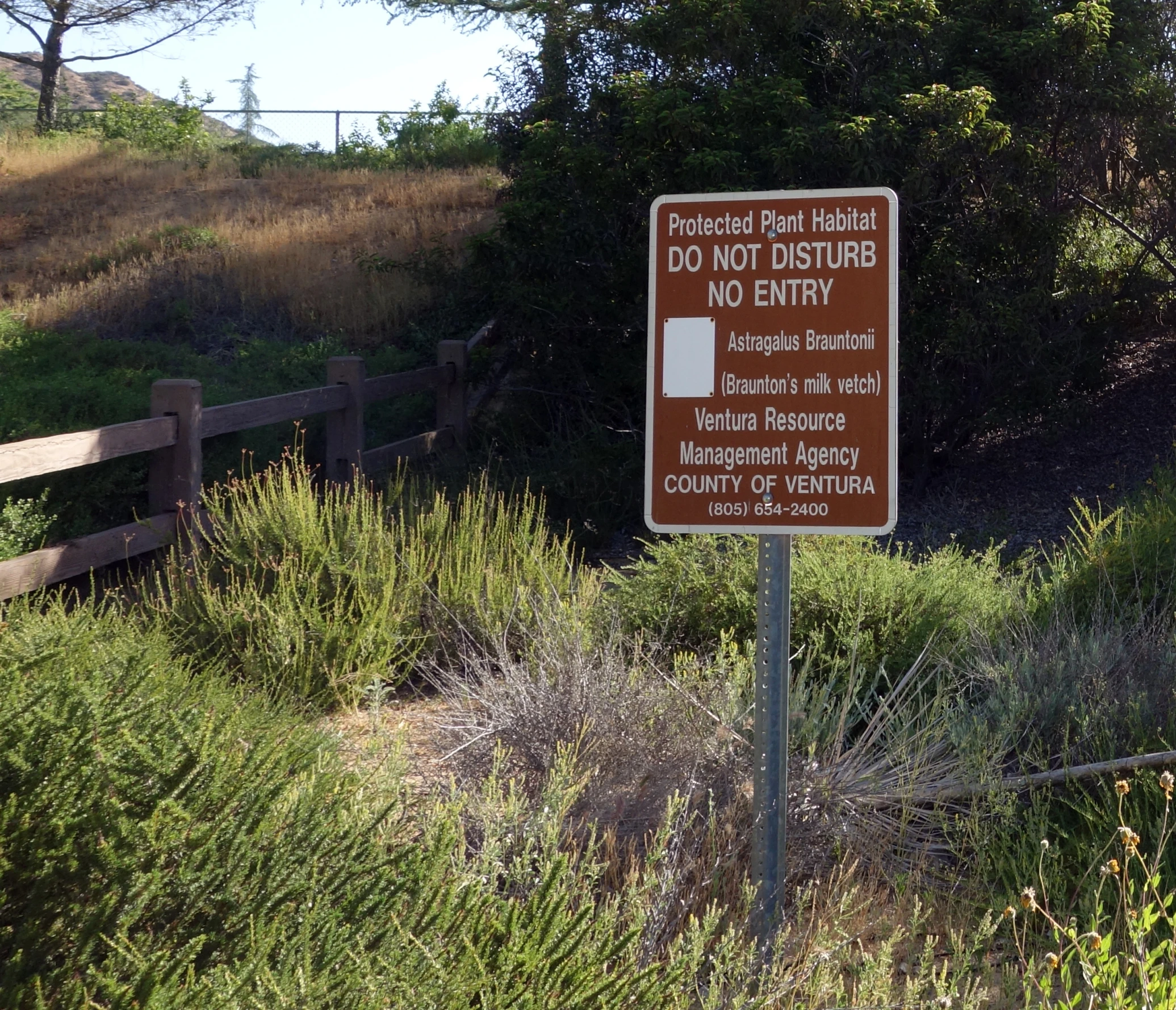 an image of a sign warning of water access on the other side