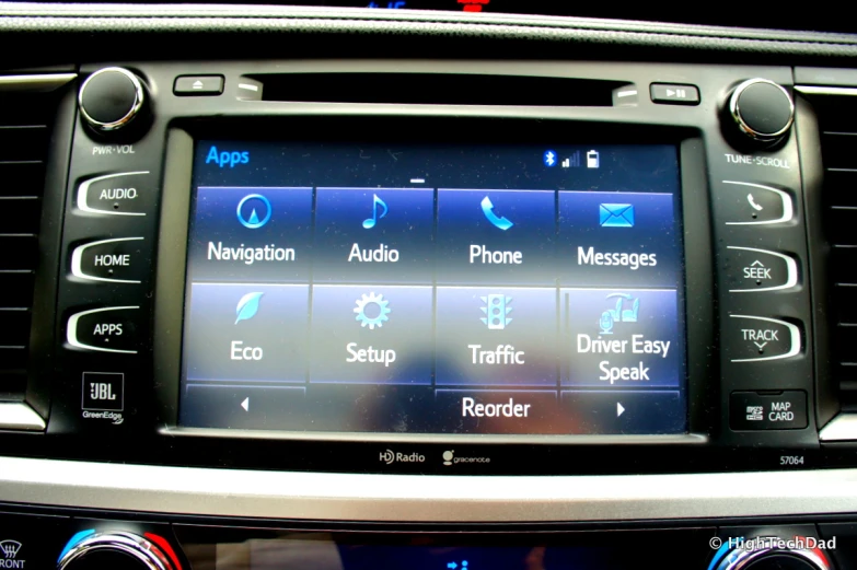 a car radio with blue ons on display in the car