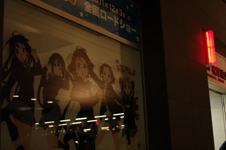 a neon sign is shown in the window of a store