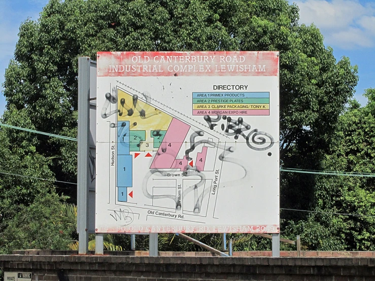 a large white sign with a road map on it