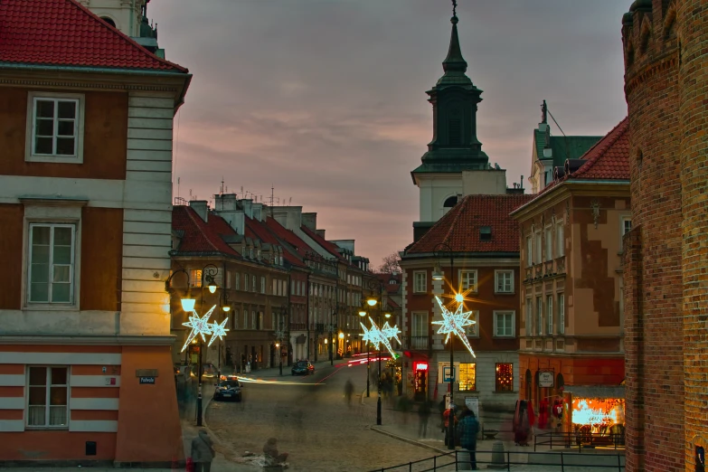 christmas lights at the town square and church tower on a winter night