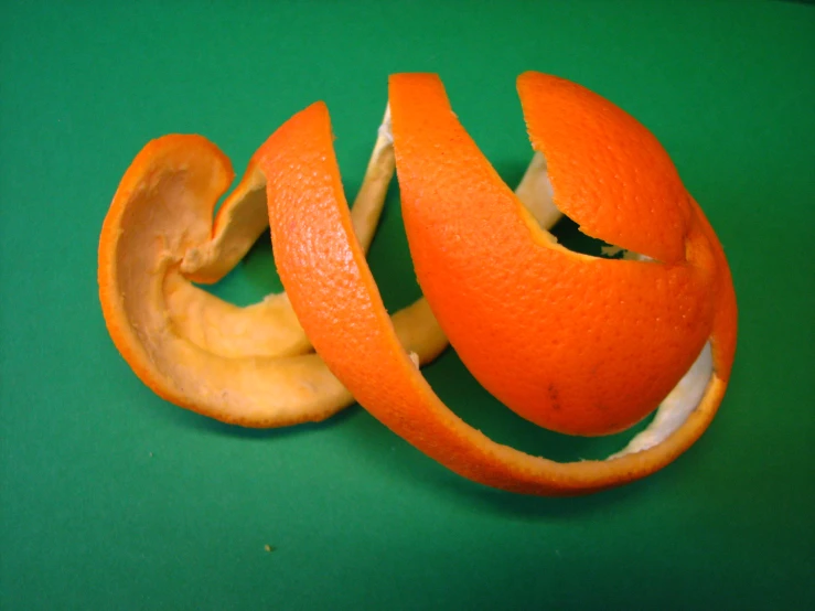 an orange that has been peeled and cut in half