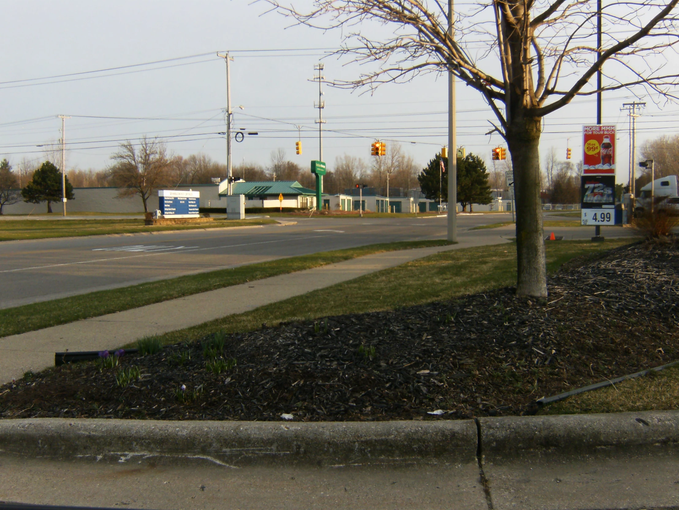 there are three signs for a gas station