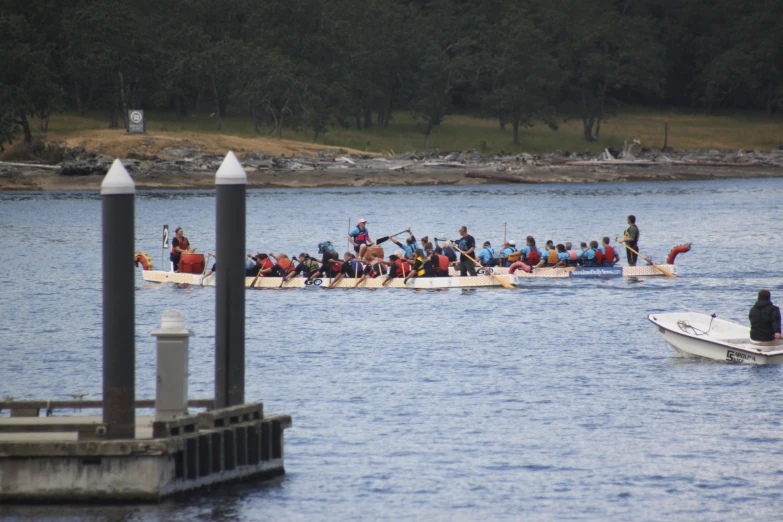 a group of people on boats in the water