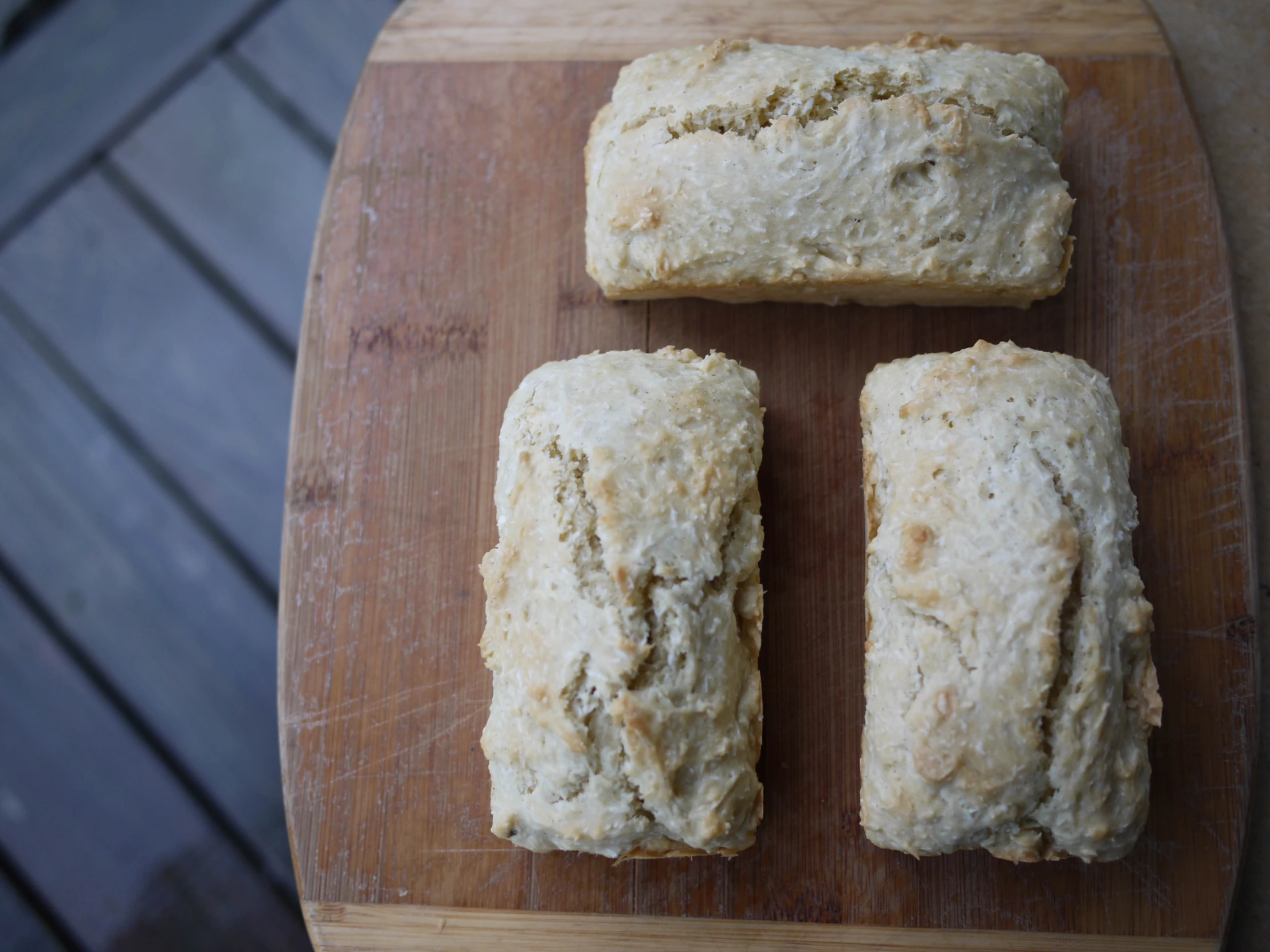 a  board with four different type of bread