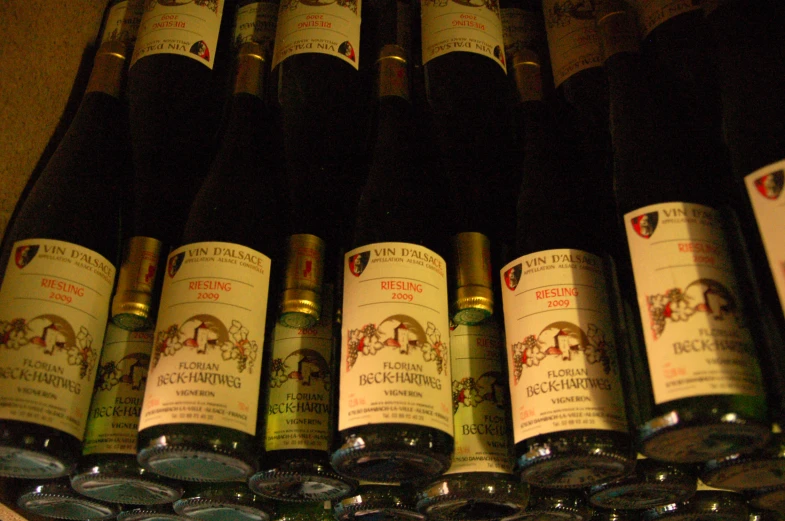 several bottles of wine are on display in a wine cellar