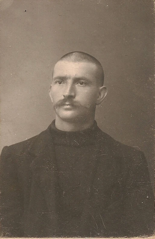 an old po of a man with a mustache