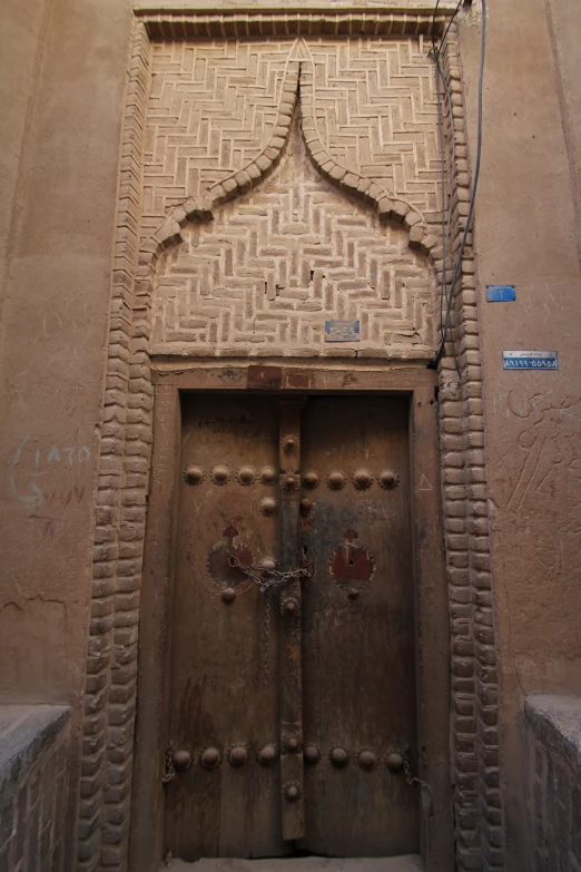 a very big door that is made of some bricks