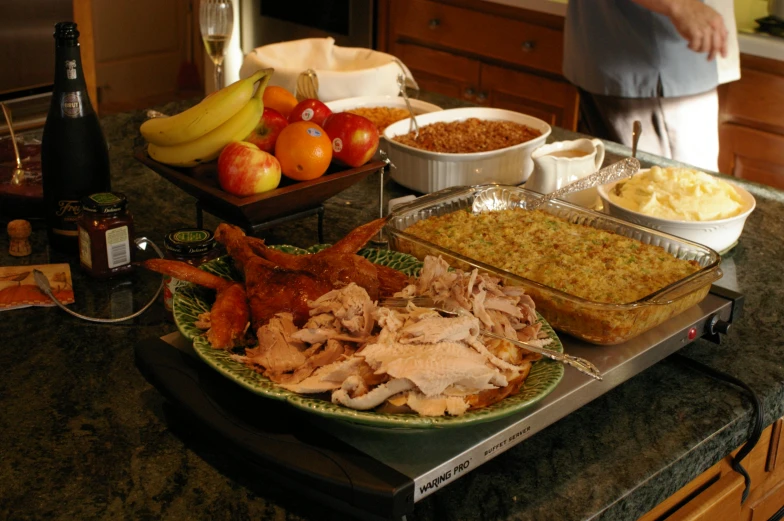 a counter full of plates filled with food