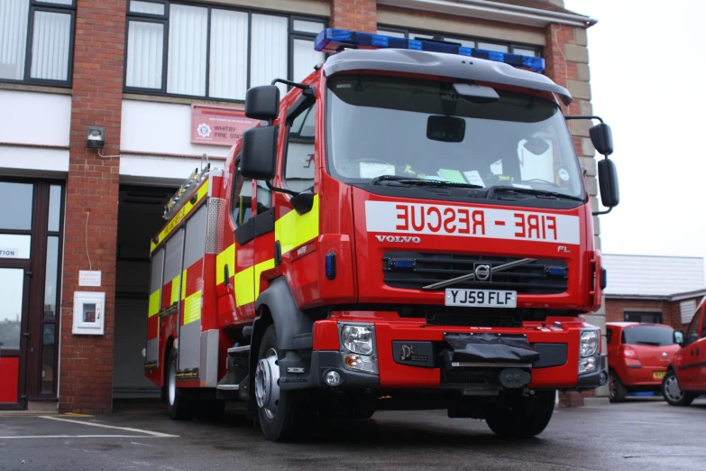 fire engine in front of an industrial building