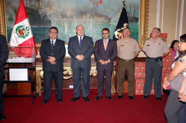 some men in suits and ties standing together