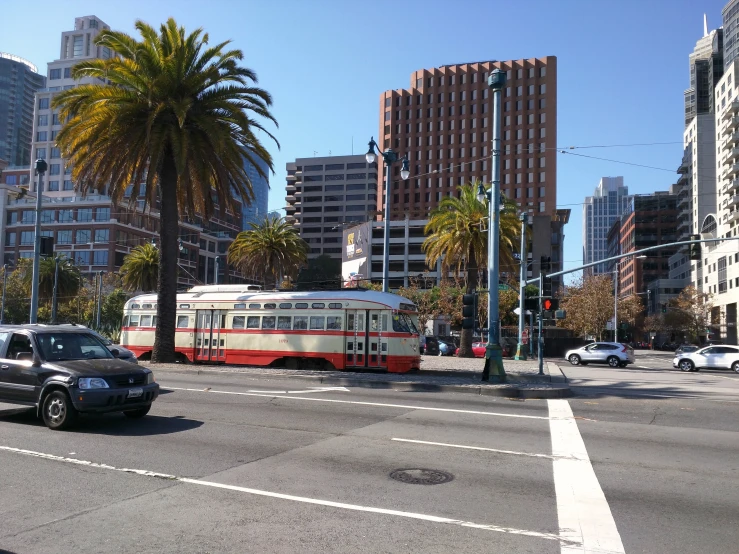 a public transit bus on an otherwise empty street