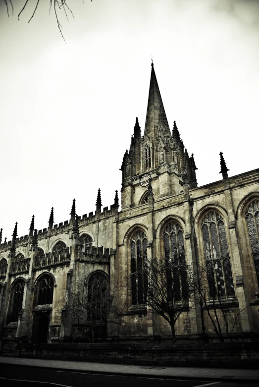 a large stone building with a clock on the front