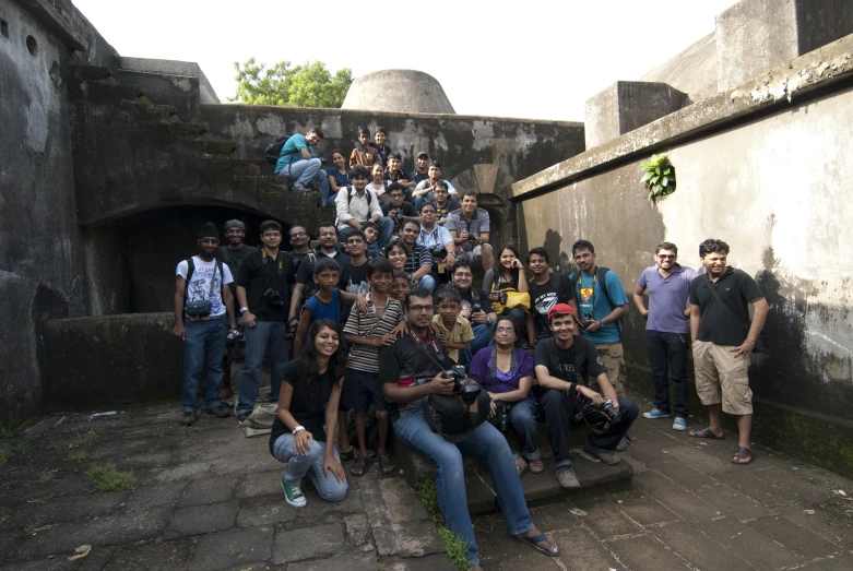 a large group of people standing on stairs