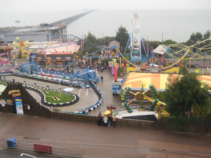 a fairground with rides, swings and swings