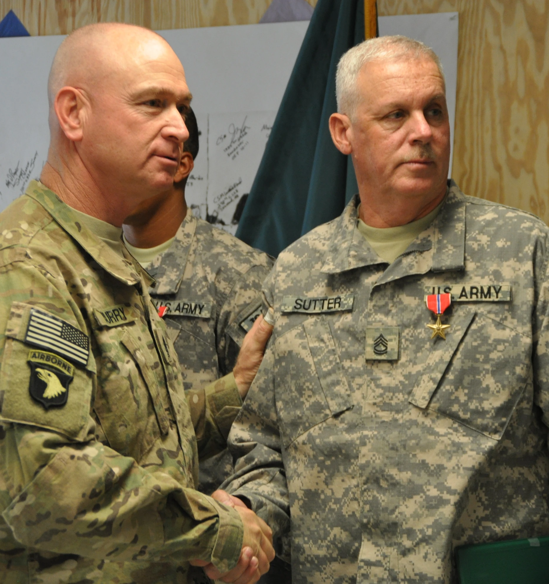 two soldiers have hand and talk while they are talking