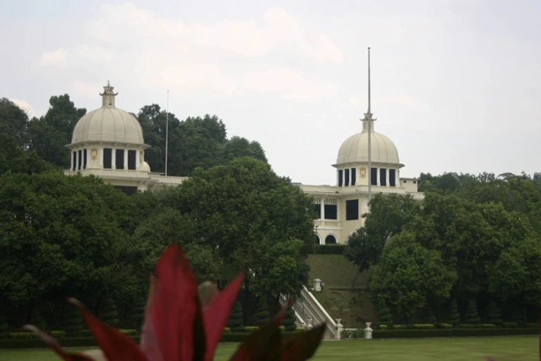 a large white building with dome tops