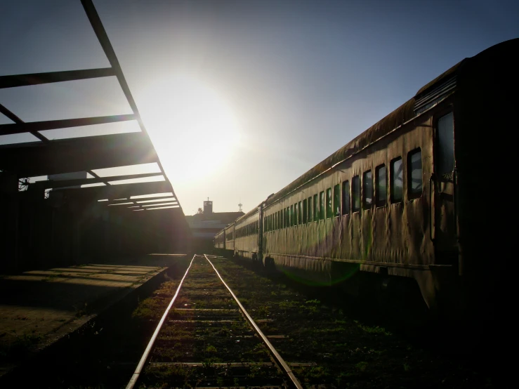 the sun is shining through the train windows