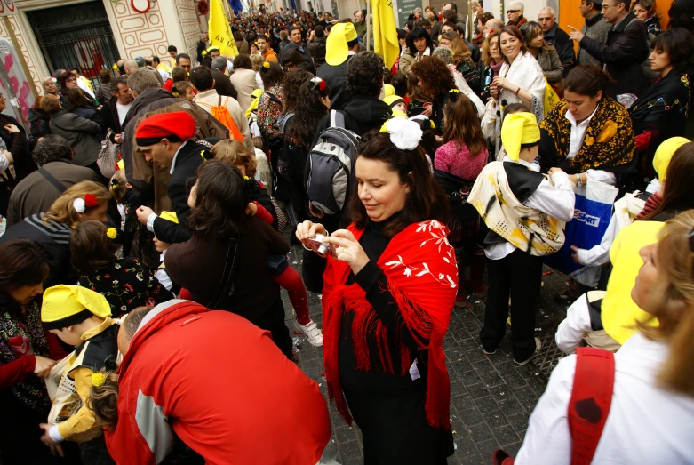 a very large crowd of people walking in the city