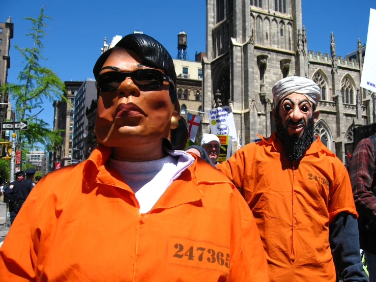 two people with masks and a face painted