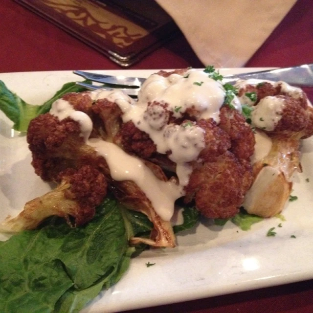 a plate with food is sitting on a table