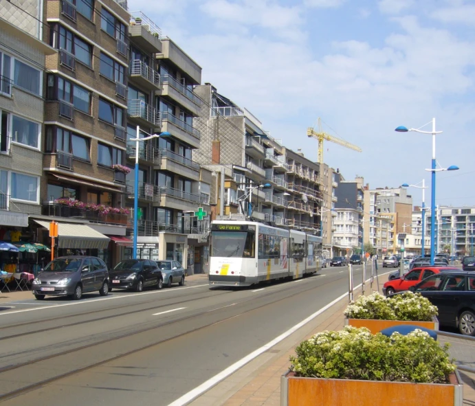 a bus drives down an empty city street