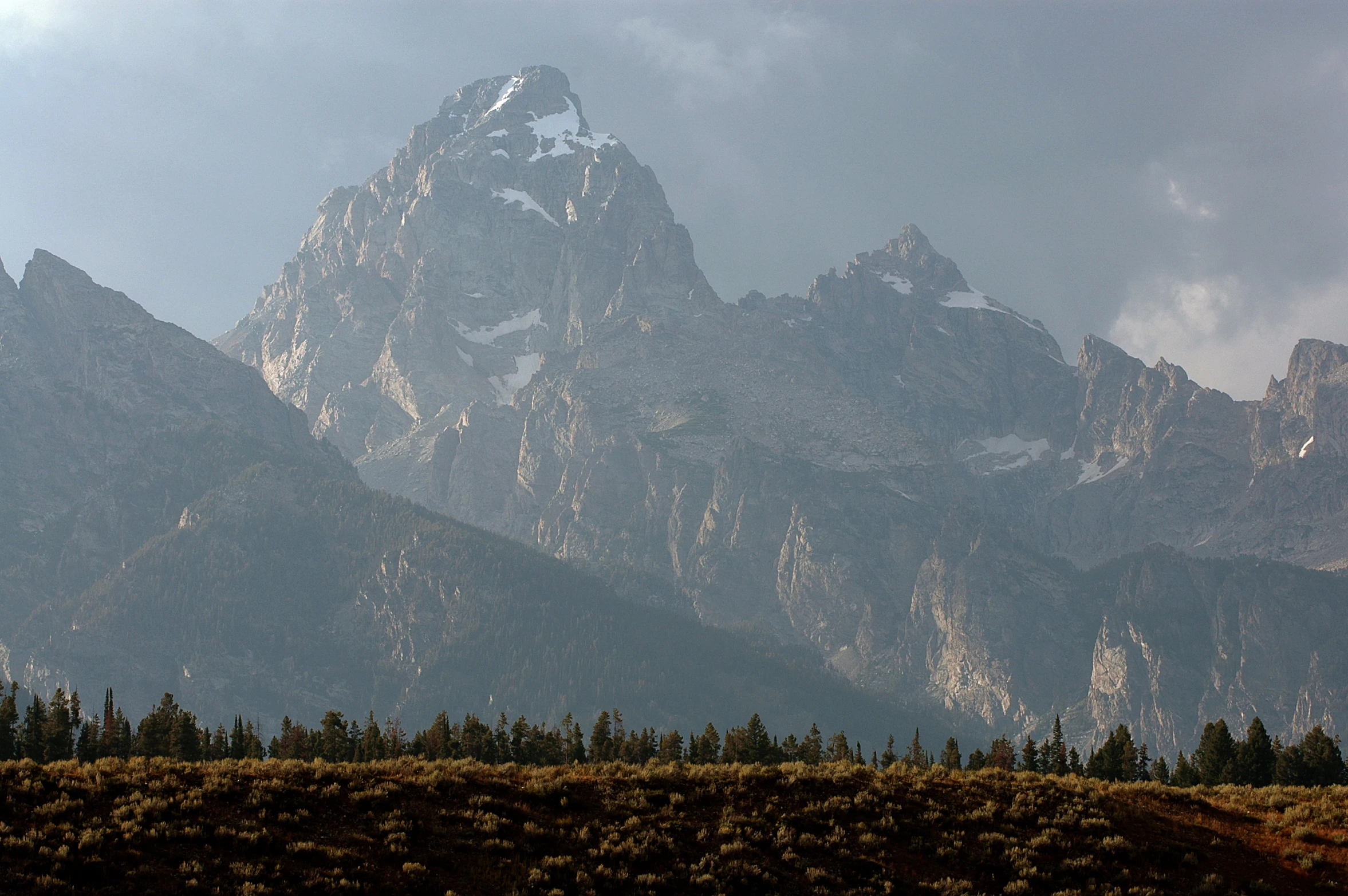 the mountain is covered in snow and ice