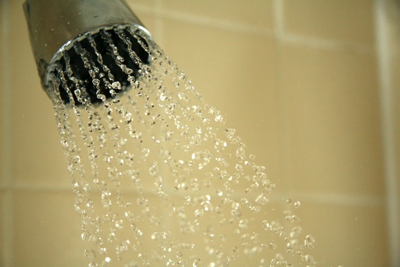 a toothbrush that is being washed with water