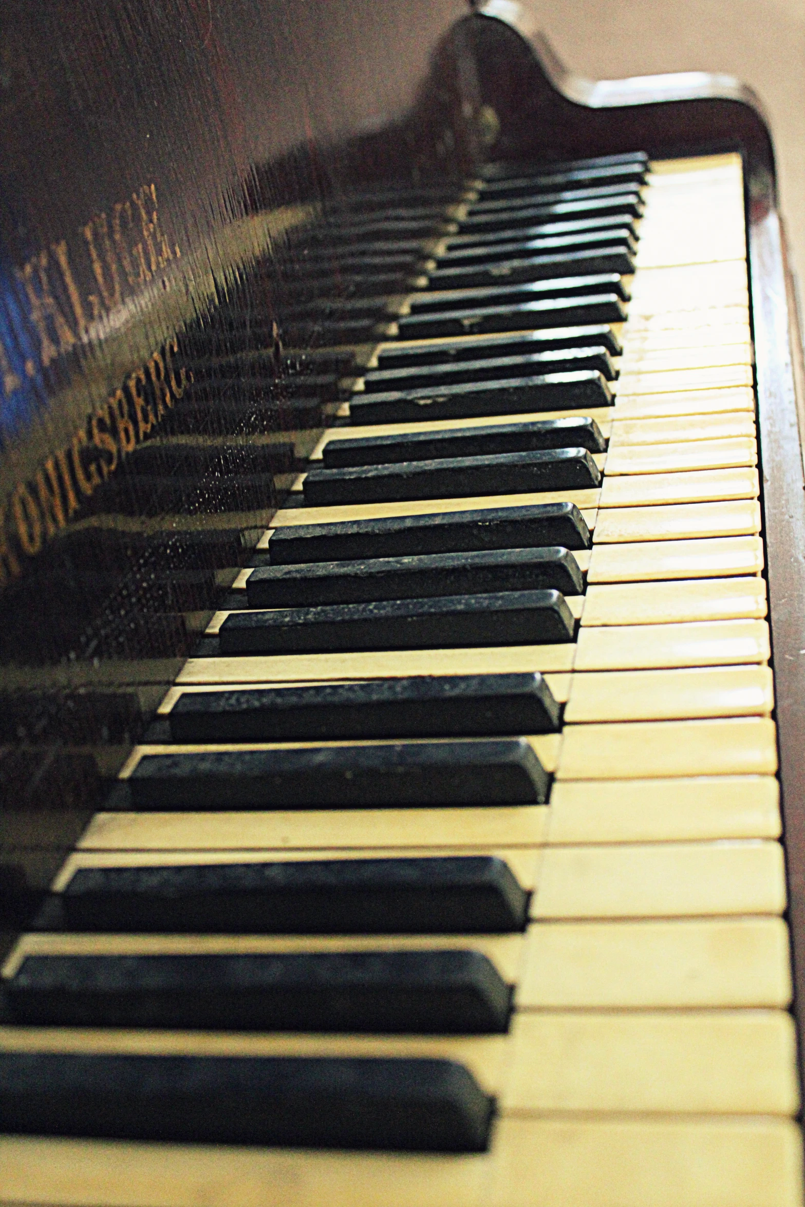 a musical keyboard with several keys sitting on a table