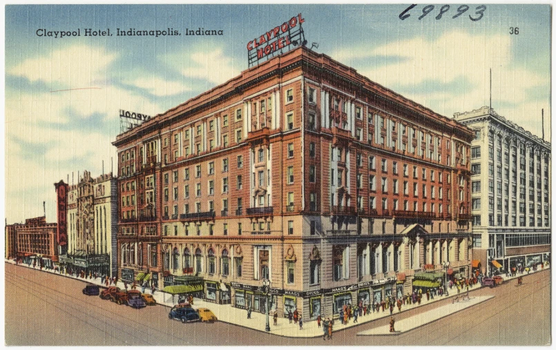 a large brown building with a red sign on top of it