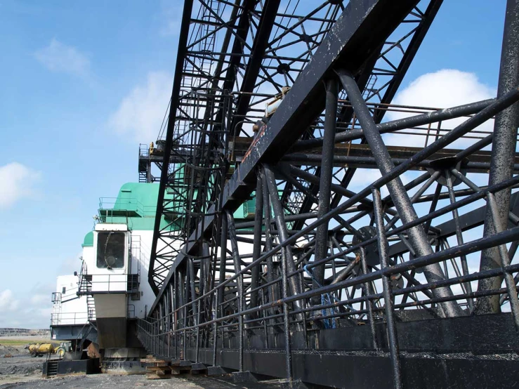 a train traveling on a bridge over a river