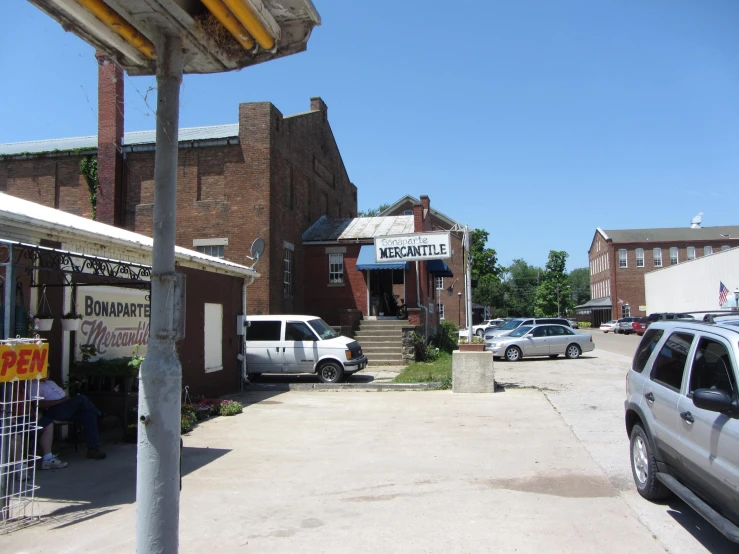 vehicles are parked on the side walk