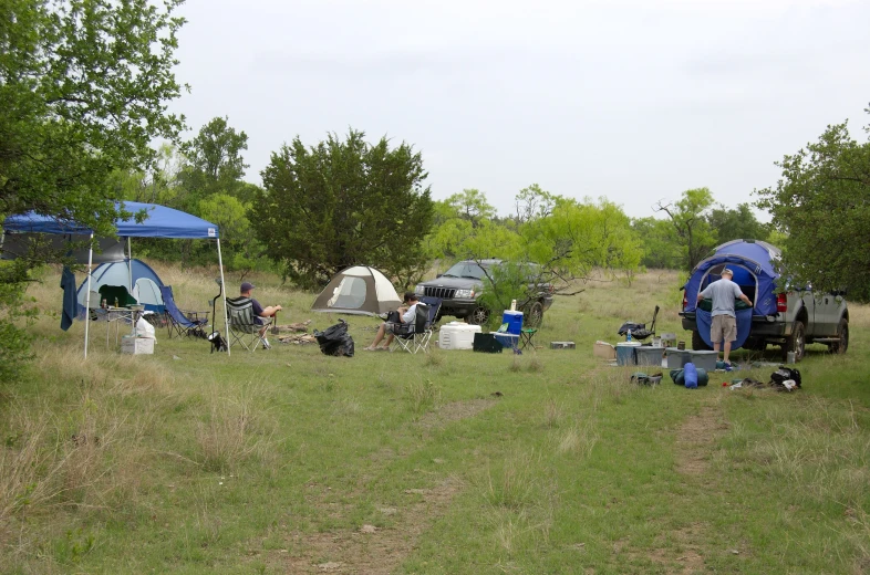 camping tents in the field set up for outdoor activities