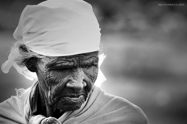 a man wearing a white head scarf with eyes