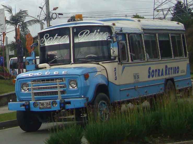 a bus is shown parked on a side walk