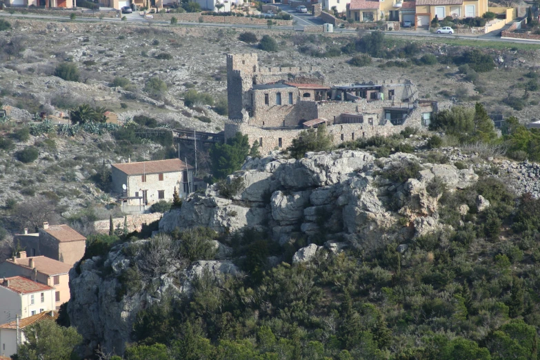 a castle like structure on the edge of a cliff