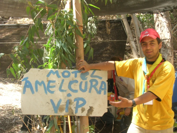 a man holding up an american wild animal