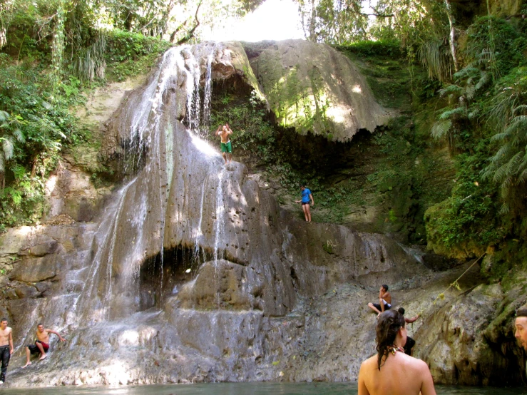 a waterfall is a huge source for people swimming