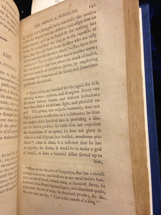 a book opened to reveal text