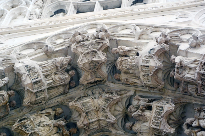 a close up of the intricate architectural details of a building