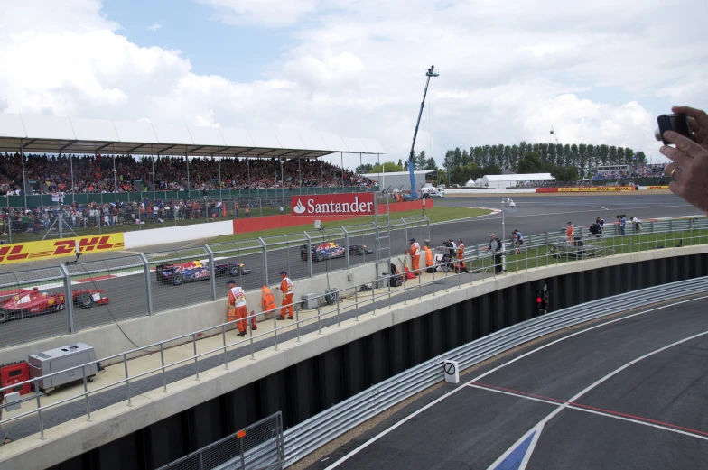 an overview of a racing track from the top floor