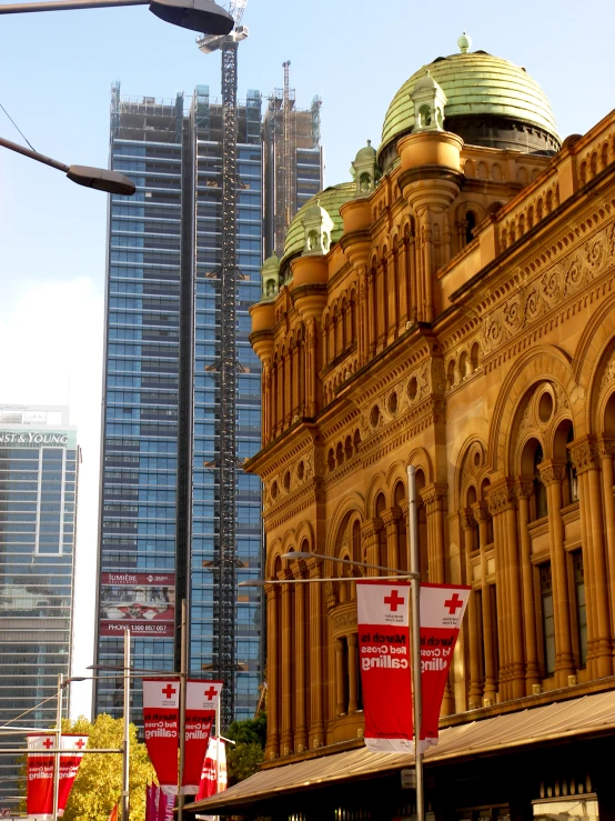 large ornate building with dome roof in urban setting