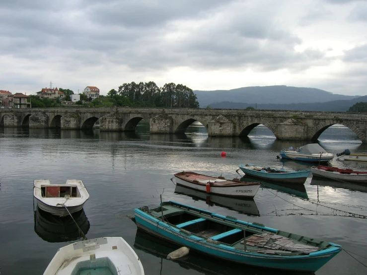 a bunch of boats that are sitting in the water