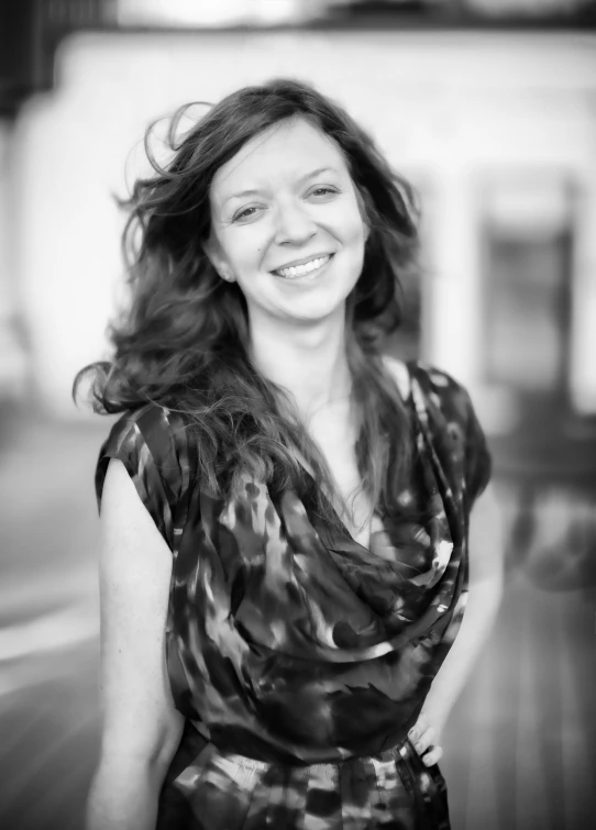 a black and white po of a woman smiling