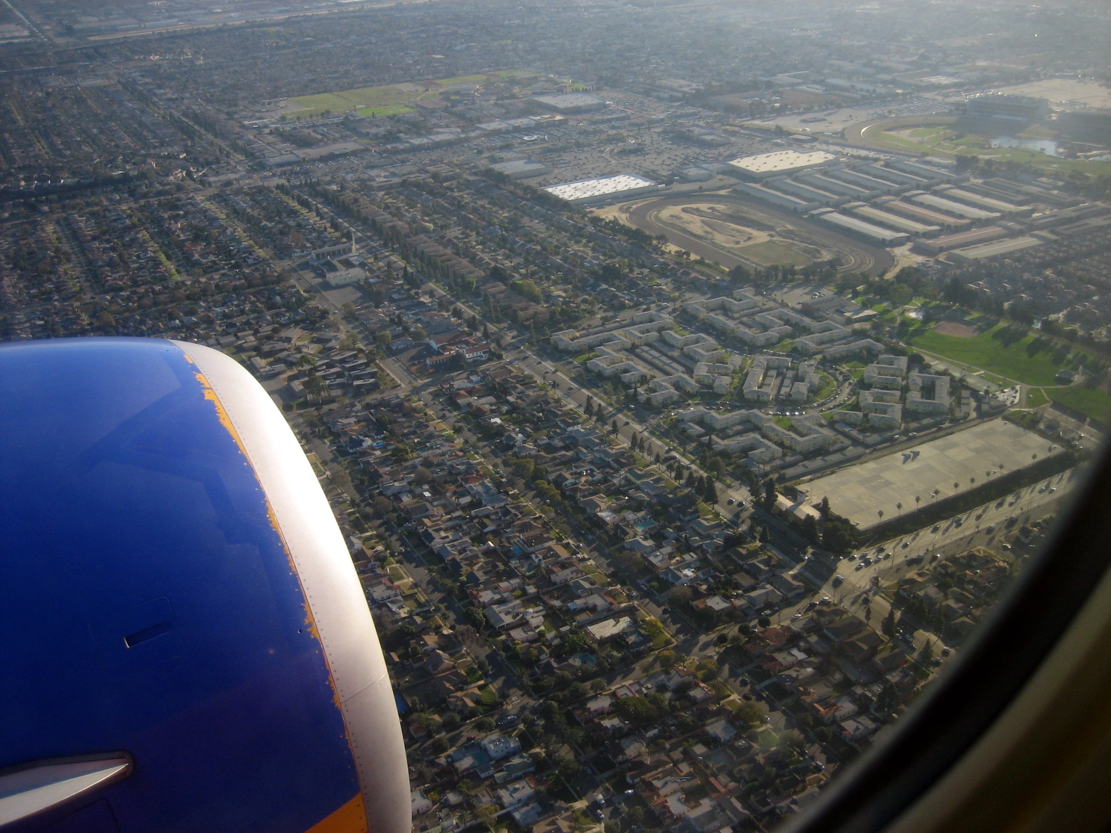 an air plane with a bunch of buildings in it