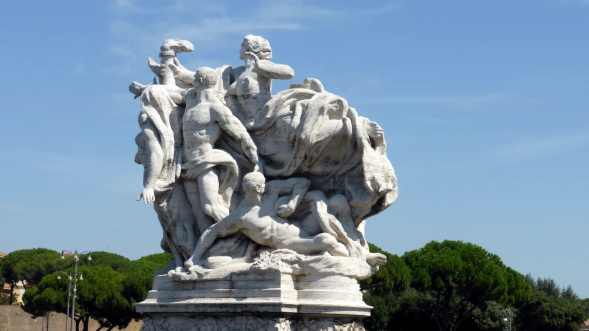 some statues of men and women standing together