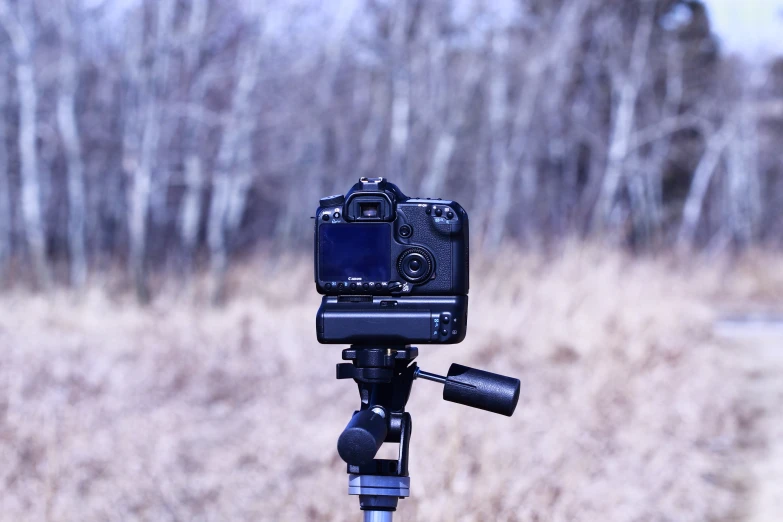 a camera that is standing on a tripod